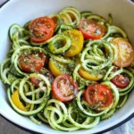 Raw Spiralized Zucchini Noodles with Tomatoes and Pesto