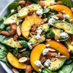 Summer Peach Spinach Salad with Avocado, Toasted Almonds + Goat Cheese