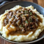 Delicious chicken hamburger Gravy Over Mashed Potatoes